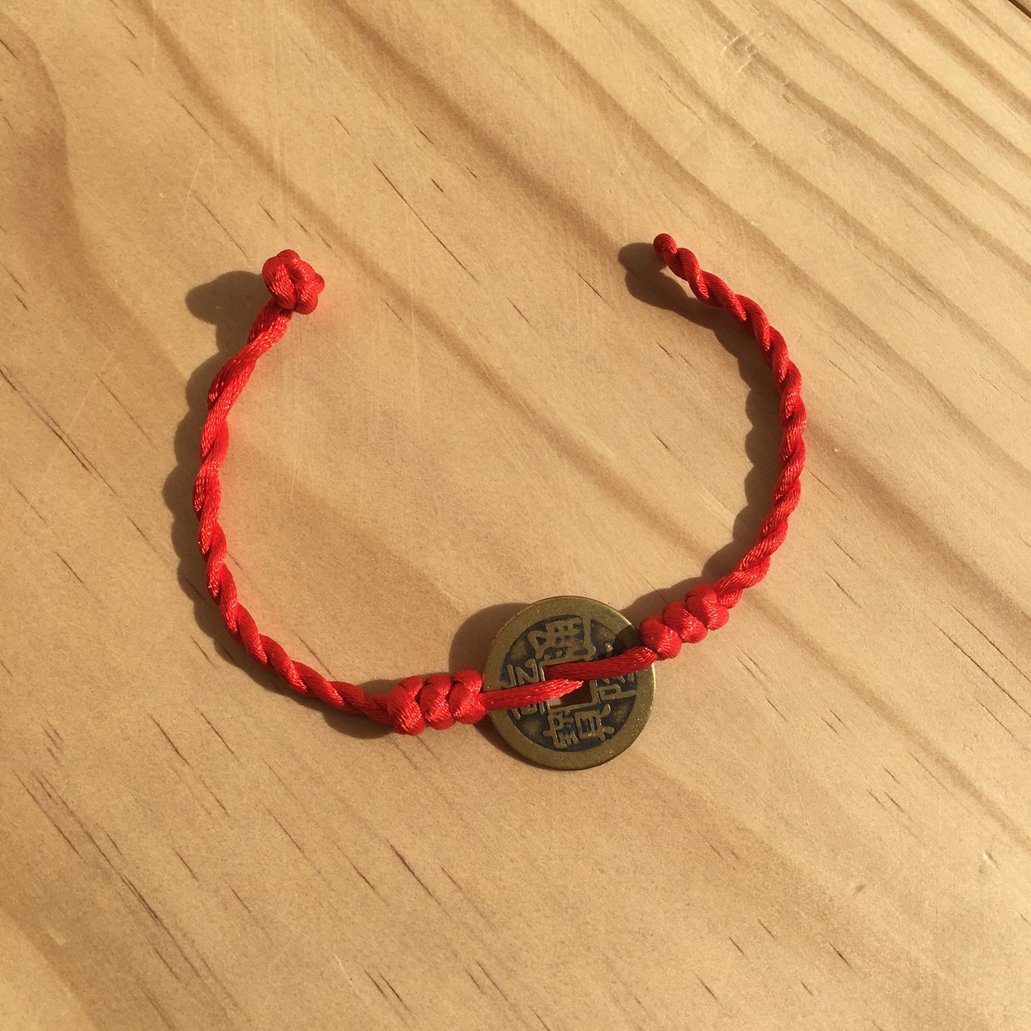 Good Fortune Coin red string woven bracelet