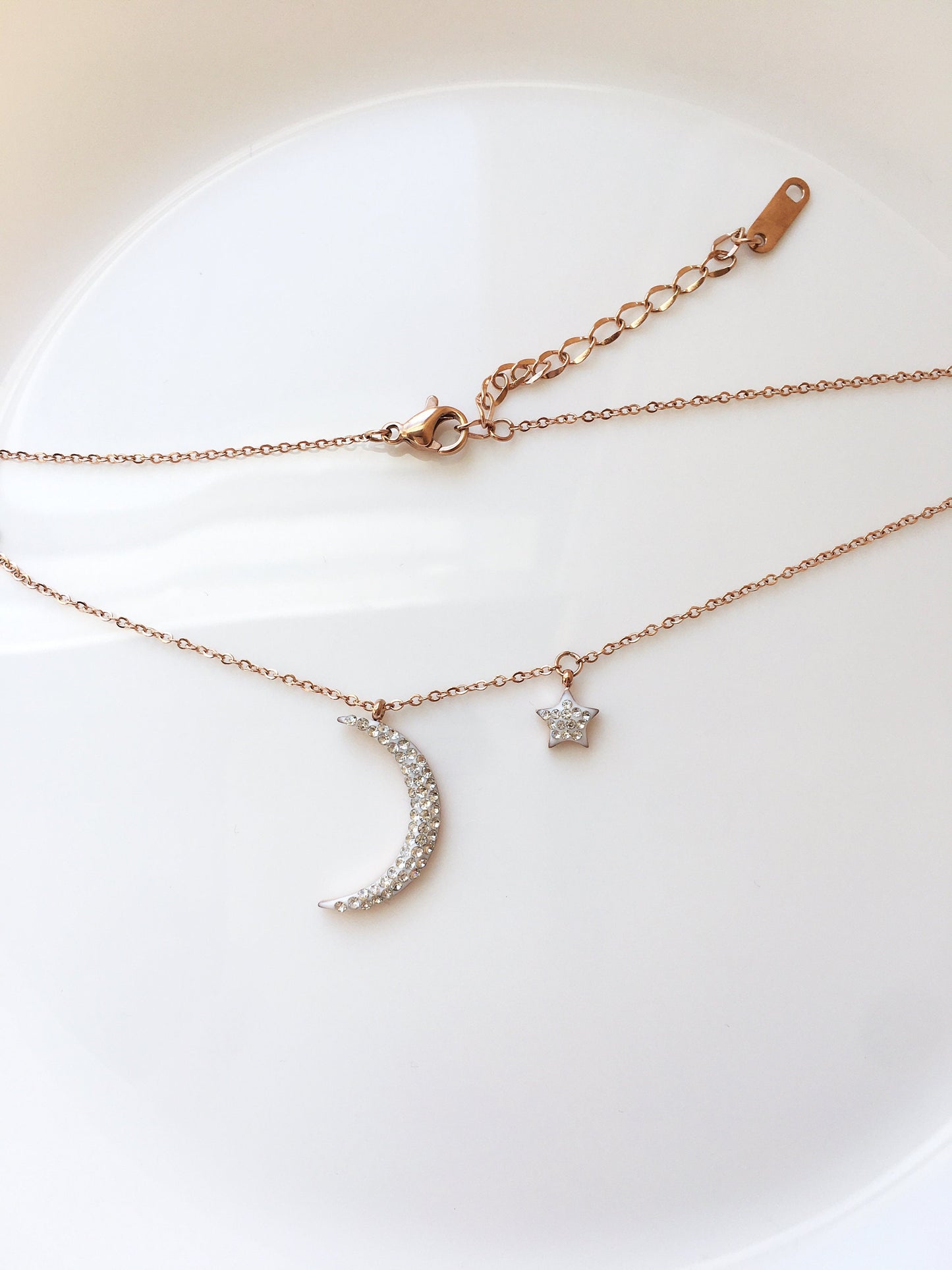 Shiny new moon shape rose gold tone stainless steel necklace