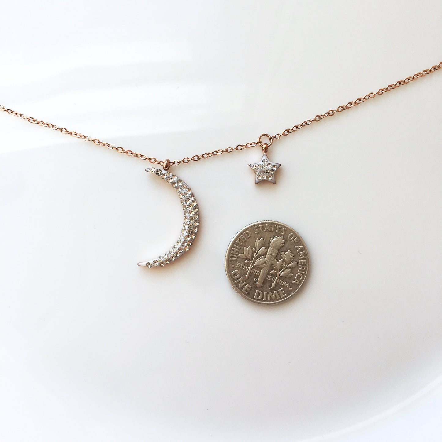 Shiny new moon shape rose gold tone stainless steel necklace