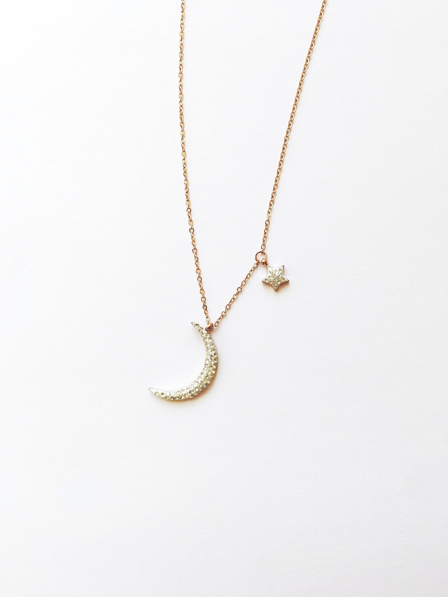 Shiny new moon shape rose gold tone stainless steel necklace