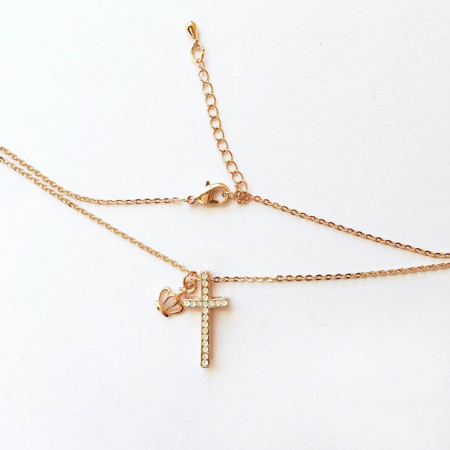 Shiny cross, crown rose gold tone necklace