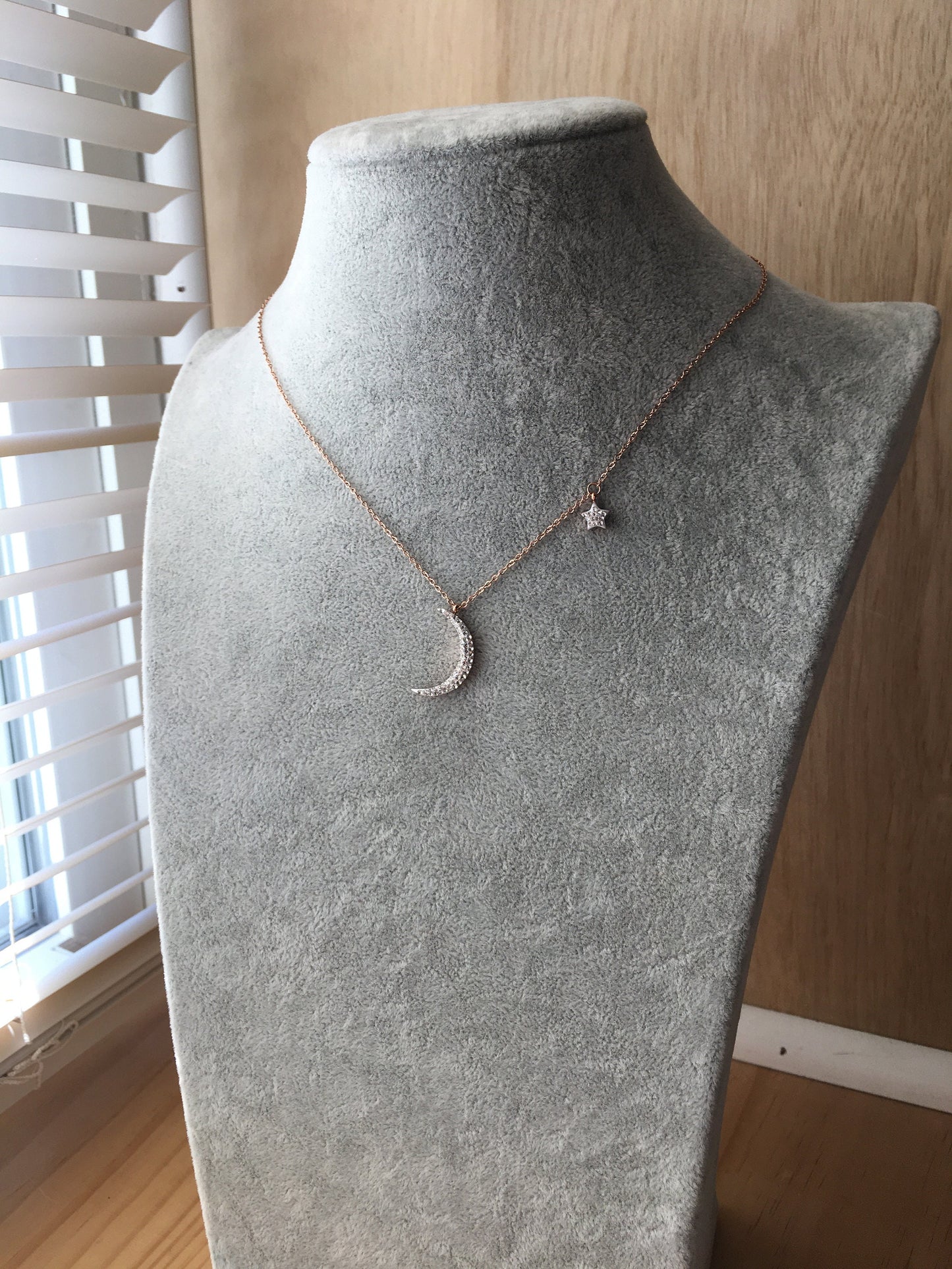 Shiny new moon shape rose gold tone stainless steel necklace