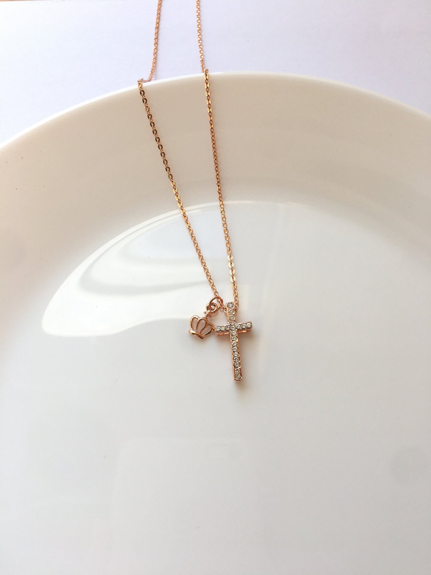 Shiny cross, crown rose gold tone necklace