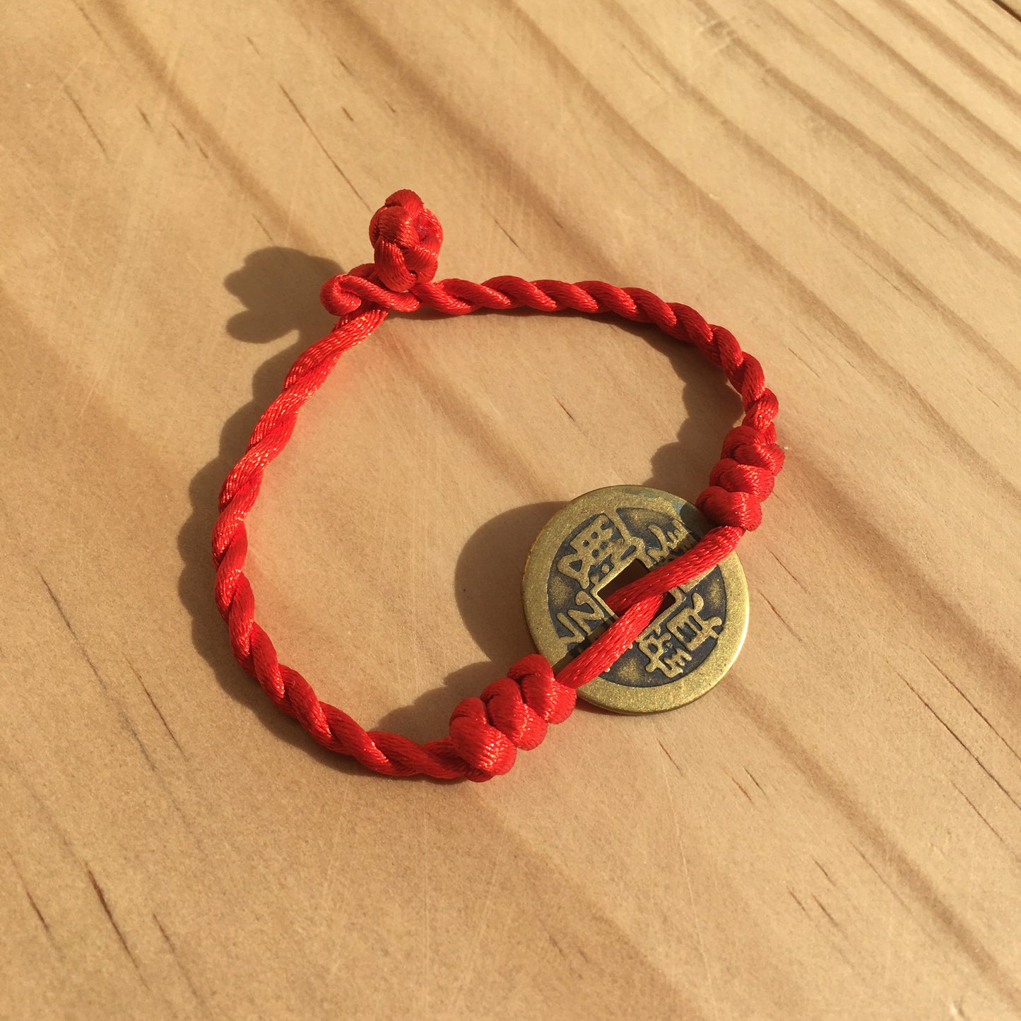 Good Fortune Coin red string woven bracelet